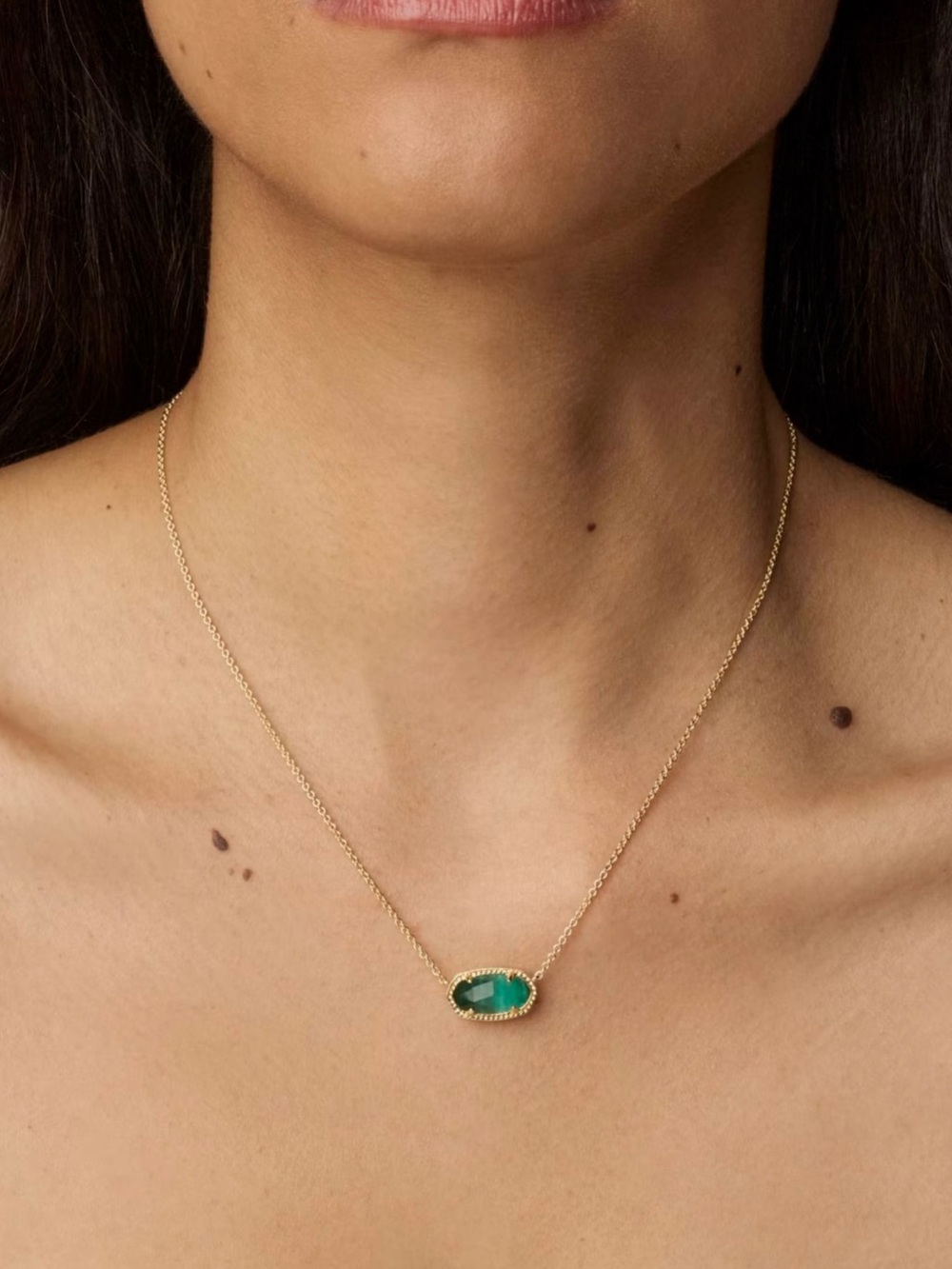 Kendra Scott Gold Necklace with Emerald Green Oval Stone